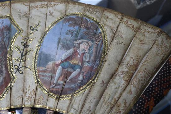 An 18th century French painted silk fan, tortoiseshell and pique work sticks